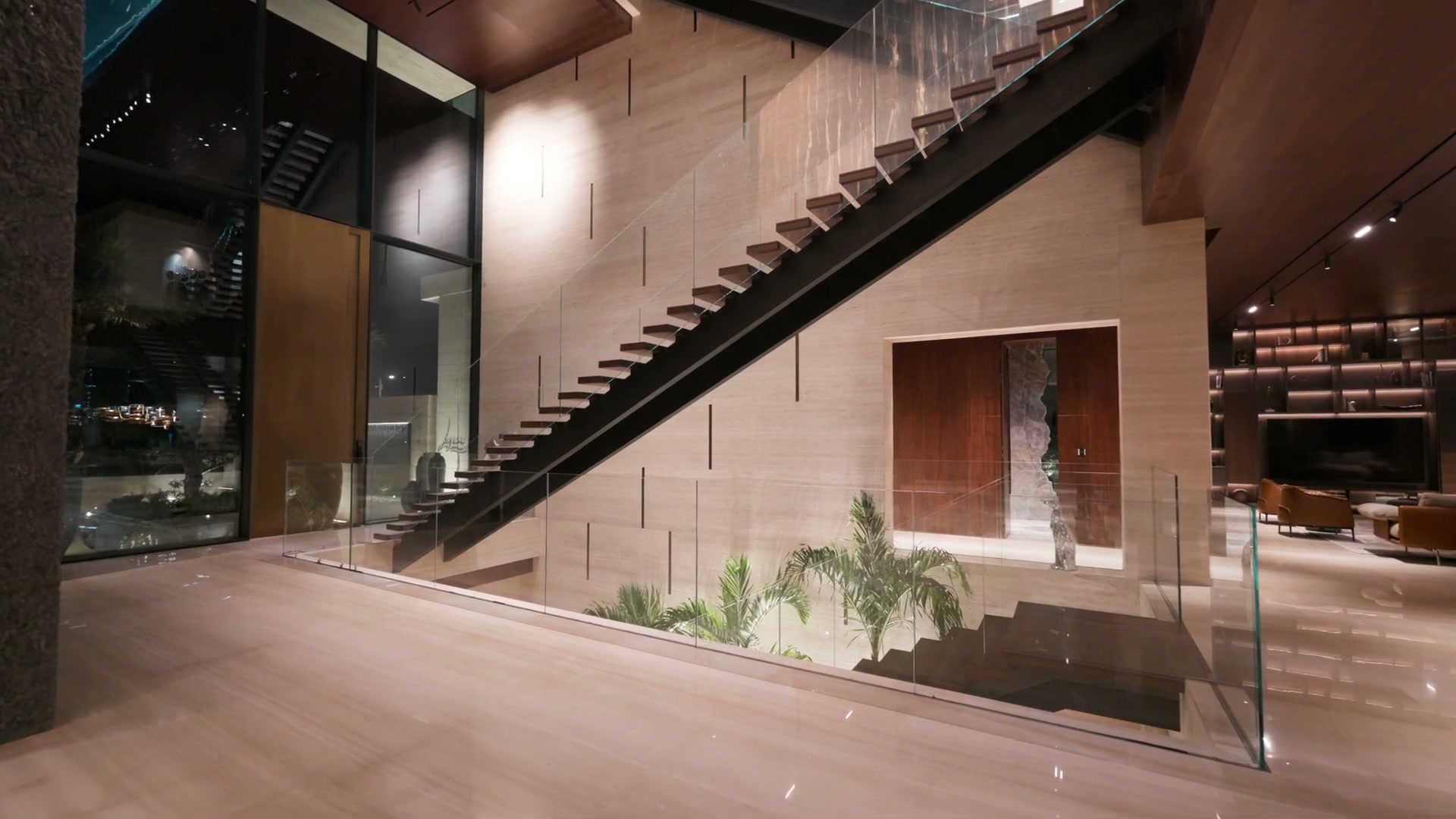 A quiet interior architectural study with a sculptural staircase